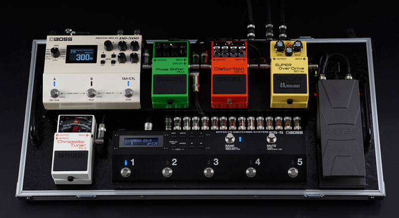 A compact pedalboard with the ES-5 effects switcher and DD-500 delay.